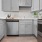 a kitchen with white cabinets