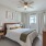 Bedroom with natural lighting and high ceilings