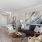 a living room with a couch and chairs