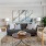 a living room with a couch and chairs