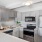 a kitchen with white cabinets