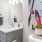 a bathroom with a mirror and a sink
